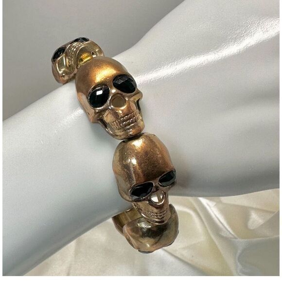 Gold tone and black stretchy skull bracelet - Picture 1 of 8